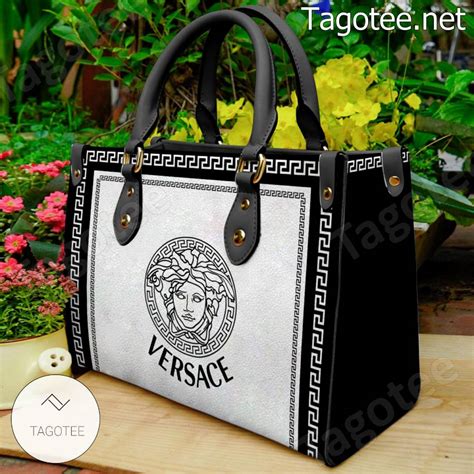 versace pouch set|Versace black and white purse.